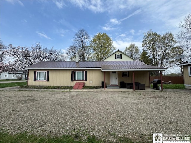 view of front of home featuring metal roof