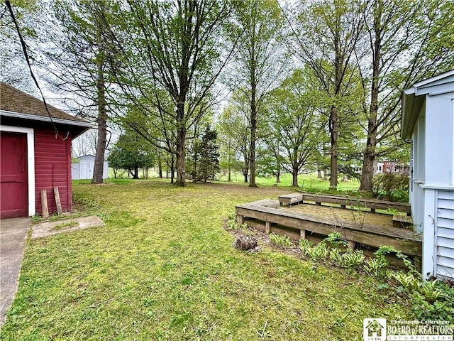 view of yard with a deck