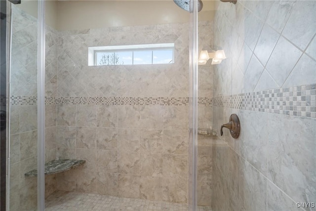full bathroom featuring a stall shower