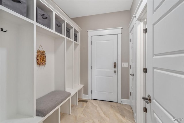 mudroom featuring baseboards