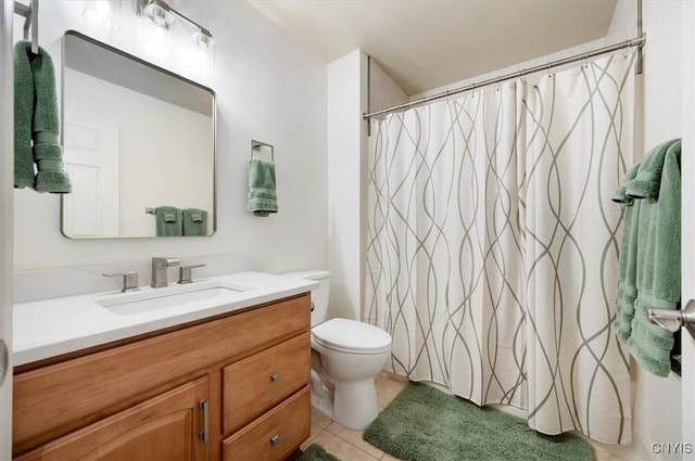 full bathroom with toilet, a shower with shower curtain, tile patterned flooring, and vanity