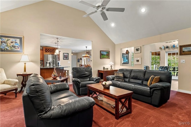 living area featuring ceiling fan, carpet floors, baseboards, high vaulted ceiling, and recessed lighting