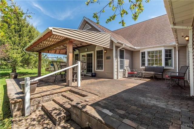 view of patio featuring outdoor dining area and an outdoor living space