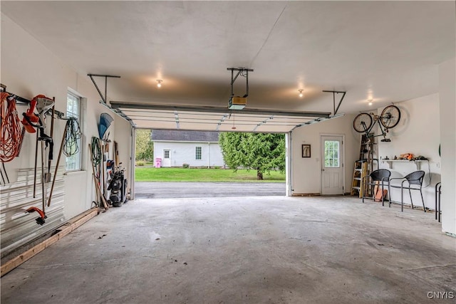 garage featuring a garage door opener