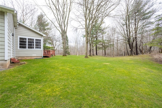 view of yard featuring a deck