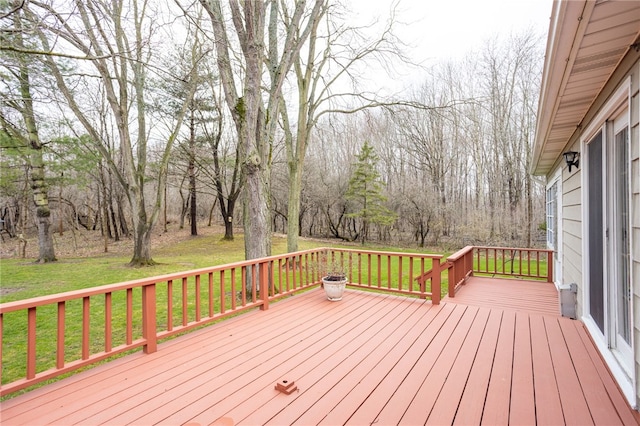 wooden deck with a yard