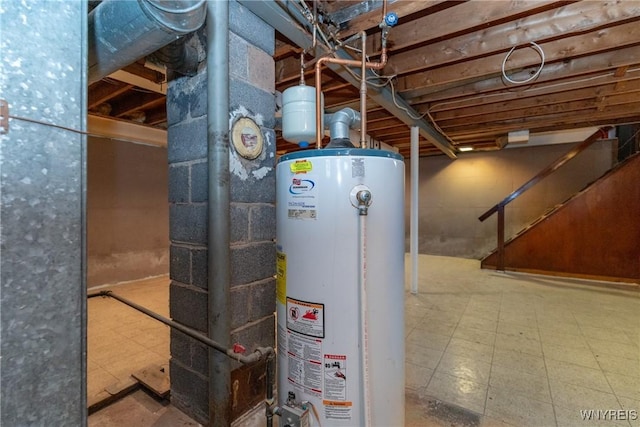 utility room with gas water heater