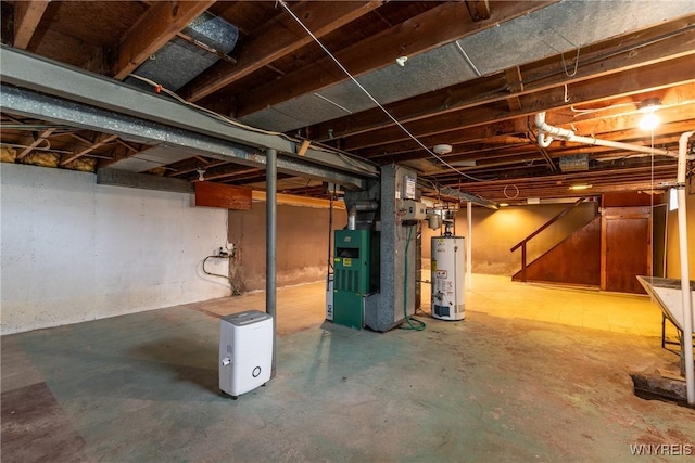 unfinished below grade area featuring gas water heater