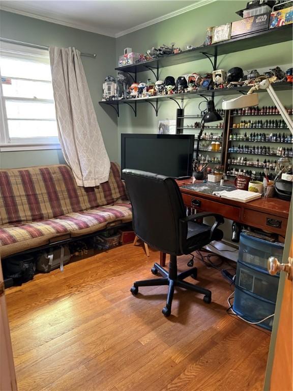 office featuring crown molding and wood finished floors