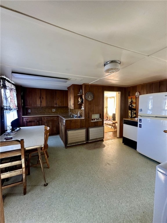 16 School St, Moravia, NY 13118 - interior space with freestanding refrigerator, open shelves, and a sink
