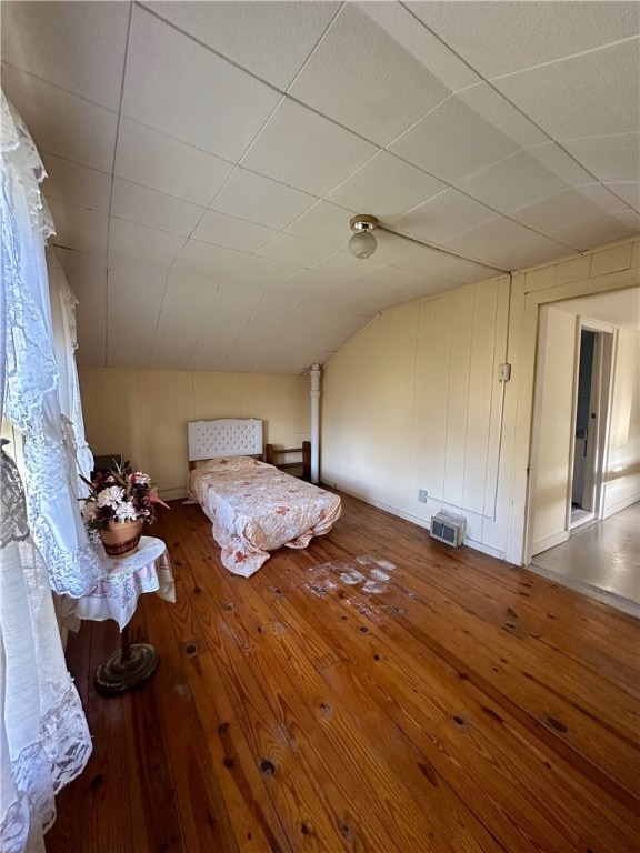 16 School St, Moravia, NY 13118 - bedroom featuring vaulted ceiling and hardwood / wood-style floors