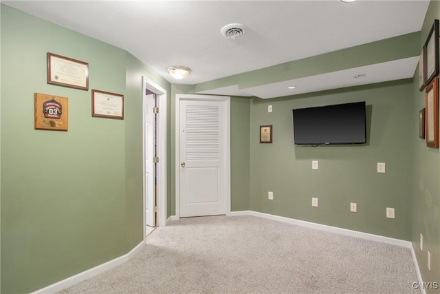 interior space with baseboards, carpet, recessed lighting, and visible vents