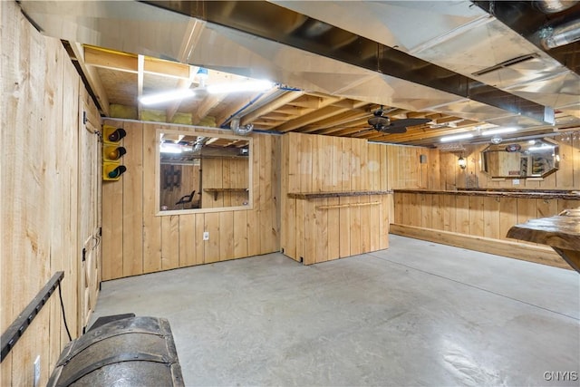 unfinished basement with wooden walls