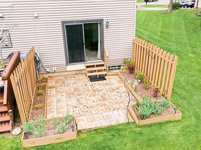 view of patio featuring fence and entry steps