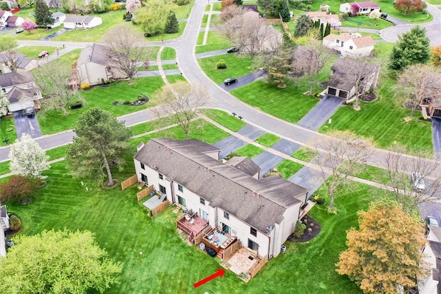 birds eye view of property with a residential view