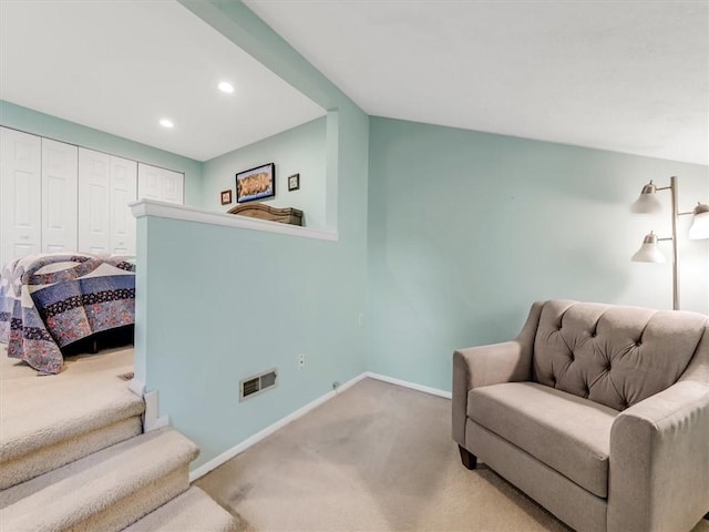 sitting room with carpet floors, baseboards, recessed lighting, and visible vents