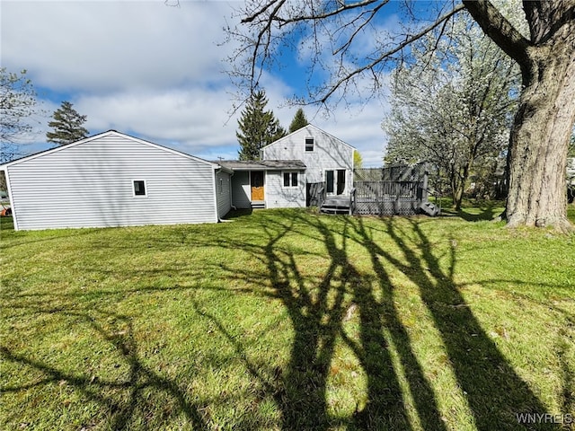 view of yard featuring a wooden deck