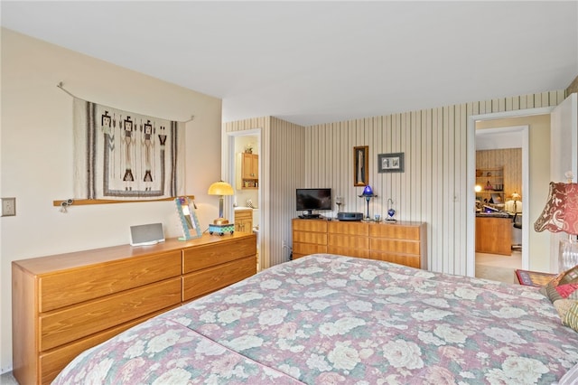 bedroom featuring wallpapered walls