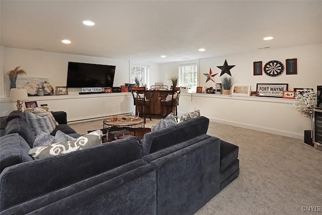 living area with recessed lighting, a dry bar, and carpet