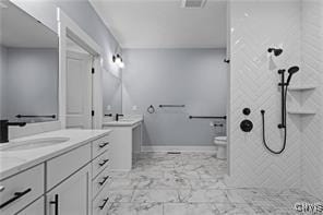 LOT16N Baltimore Ridge Rd, Marcellus, NY 13108 - full bath featuring visible vents, marble finish floor, toilet, two vanities, and a sink