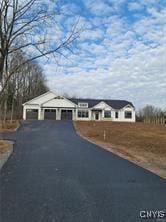 LOT16N Baltimore Ridge Rd, Marcellus, NY 13108 - view of front of house featuring a garage and aphalt driveway