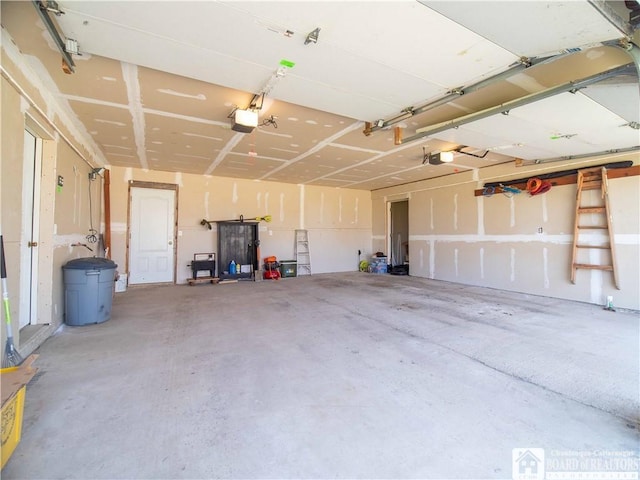 5585 Eke Rd, Harmony, NY 14710 - garage with a garage door opener