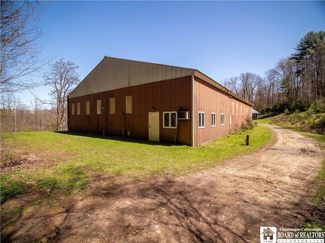 5585 Eke Rd, Harmony, NY 14710 - view of side of home featuring a yard, an outbuilding, and an outdoor structure