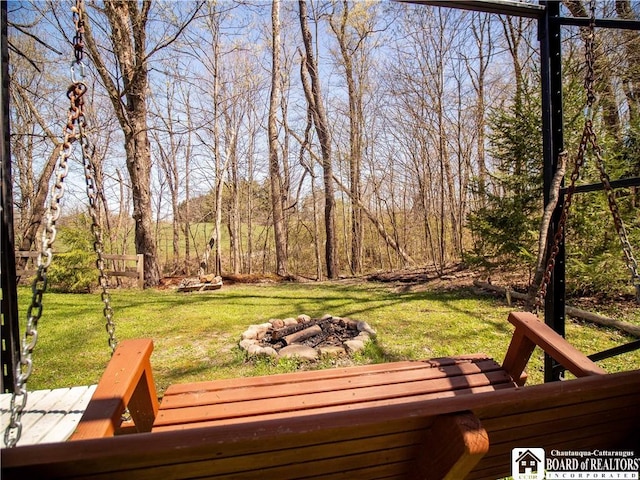 5585 Eke Rd, Harmony, NY 14710 - deck featuring a lawn and a fire pit