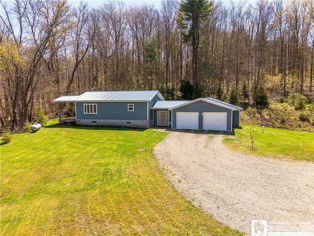 5585 Eke Rd, Harmony, NY 14710 - manufactured / mobile home with a garage, driveway, metal roof, and a front lawn