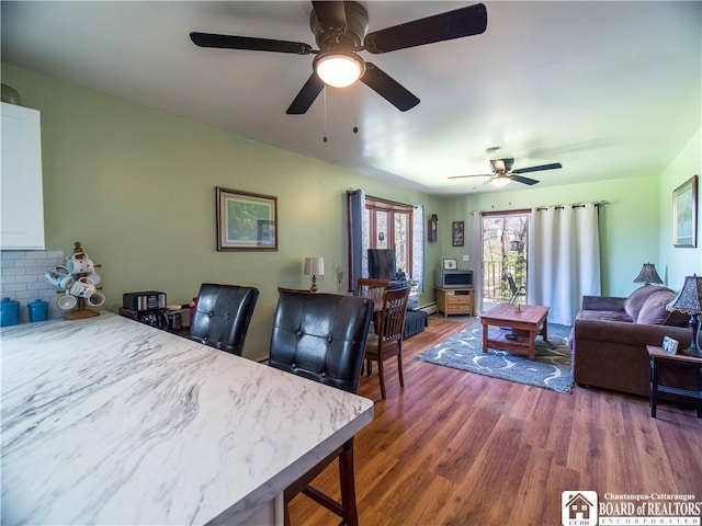 5585 Eke Rd, Harmony, NY 14710 - living area featuring ceiling fan and wood finished floors