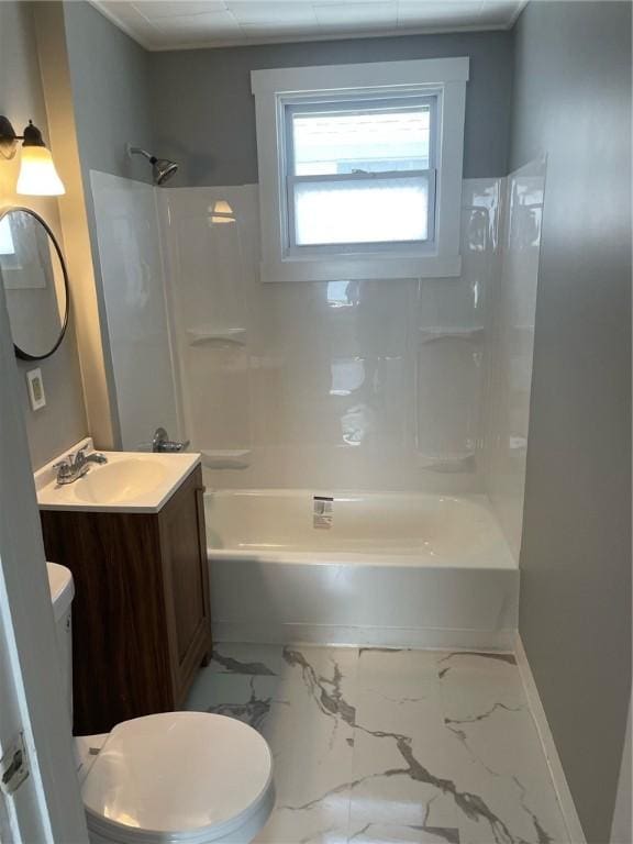 bathroom featuring shower / bathing tub combination, vanity, baseboards, toilet, and marble finish floor