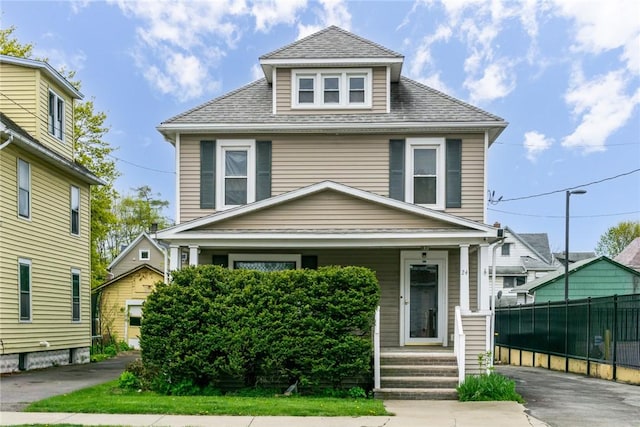 24 Sherman St, Union, NY 13790 - traditional style home featuring covered porch, fence, and roof with shingles