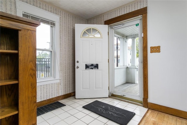 24 Sherman St, Union, NY 13790 - entrance foyer with visible vents, baseboards, plenty of natural light, and wallpapered walls