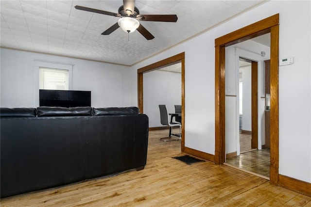 24 Sherman St, Union, NY 13790 - living room with ceiling fan, visible vents, baseboards, and light wood-style floors