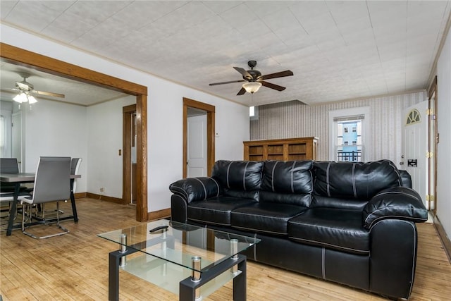 24 Sherman St, Union, NY 13790 - living area with a ceiling fan, baseboards, ornamental molding, wallpapered walls, and light wood-style flooring