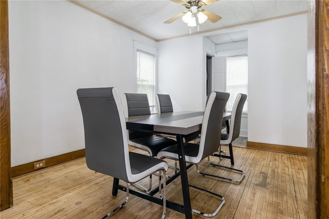 24 Sherman St, Union, NY 13790 - dining area with crown molding, a ceiling fan, baseboards, and light wood-style flooring