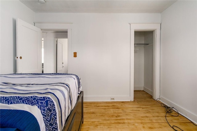 24 Sherman St, Union, NY 13790 - bedroom featuring a closet, baseboards, a spacious closet, and light wood-style floors
