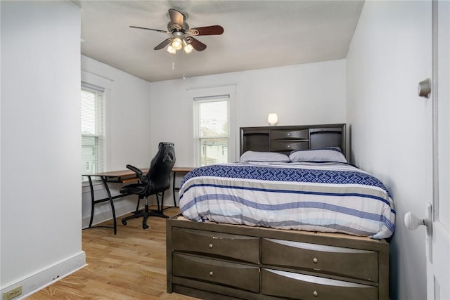 24 Sherman St, Union, NY 13790 - bedroom featuring baseboards, multiple windows, ceiling fan, and light wood-style floors