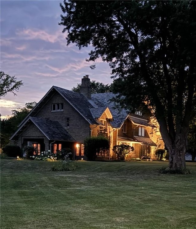 43 S Main St, Elba, NY 14058 - view of front facade with a yard and a chimney