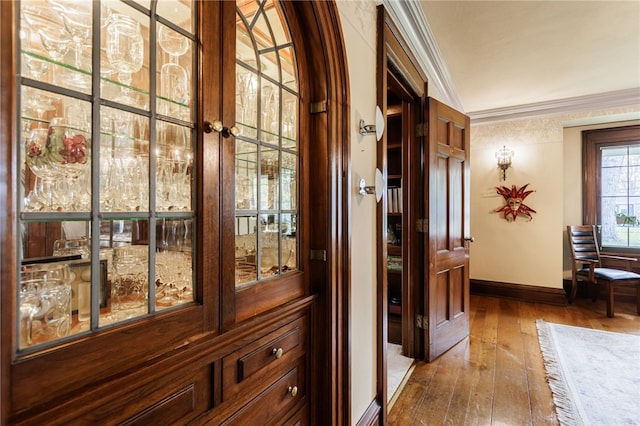 43 S Main St, Elba, NY 14058 - corridor featuring wood-type flooring, baseboards, and ornamental molding