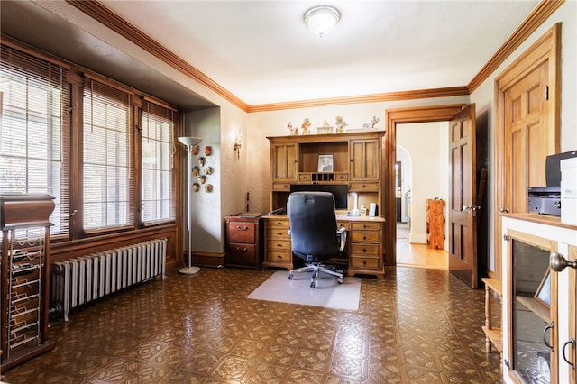 43 S Main St, Elba, NY 14058 - home office featuring radiator heating unit, baseboards, ornamental molding, and arched walkways