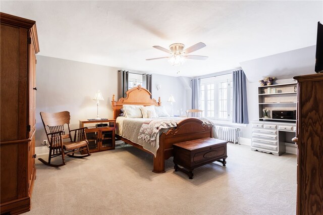 43 S Main St, Elba, NY 14058 - bedroom with radiator heating unit, multiple windows, and light colored carpet