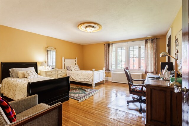 43 S Main St, Elba, NY 14058 - bedroom with wood finished floors, a desk, and baseboards