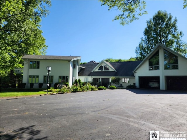 3539 Morley Rd, North Harmony, NY 14710 - view of front facade featuring a garage and aphalt driveway