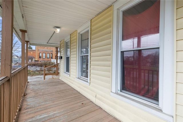 wooden deck featuring covered porch