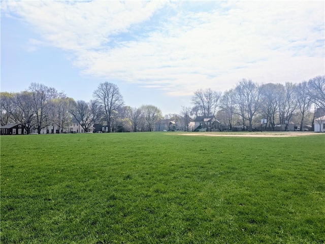 view of community featuring a lawn