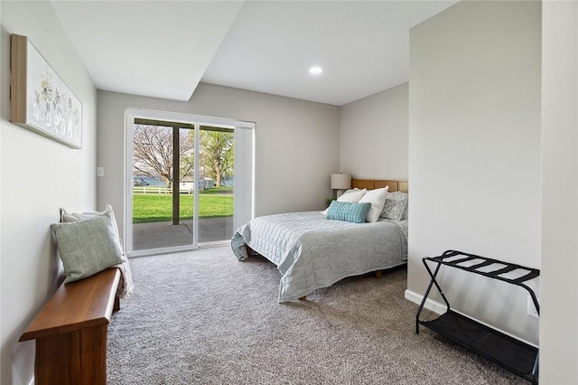 carpeted bedroom featuring access to outside and recessed lighting
