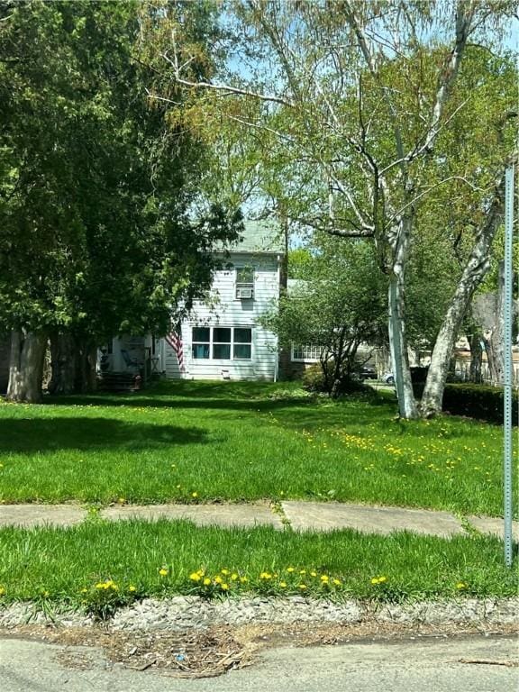 exterior space with a front yard