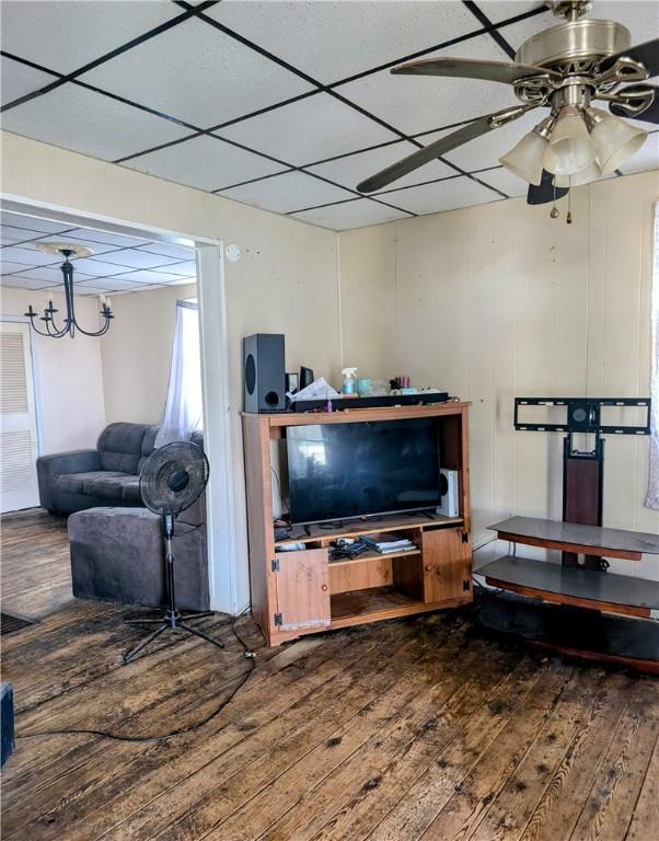 603 W 2nd St, Elmira-City, NY 14905 - living room featuring hardwood / wood-style floors, ceiling fan, and a paneled ceiling