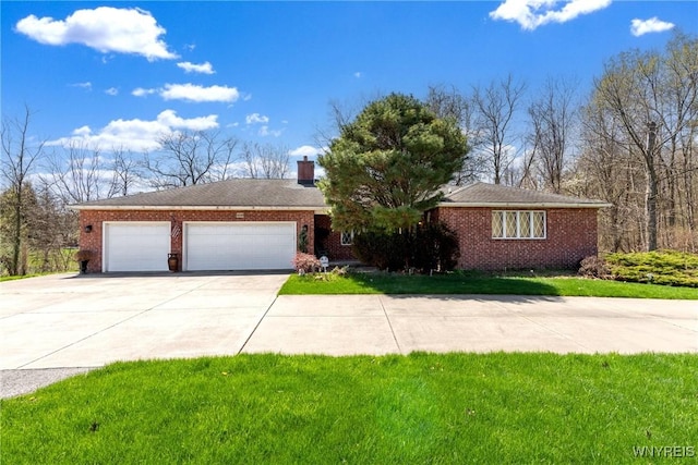 ranch-style home with a chimney, brick siding, a front lawn, concrete driveway, and an attached garage